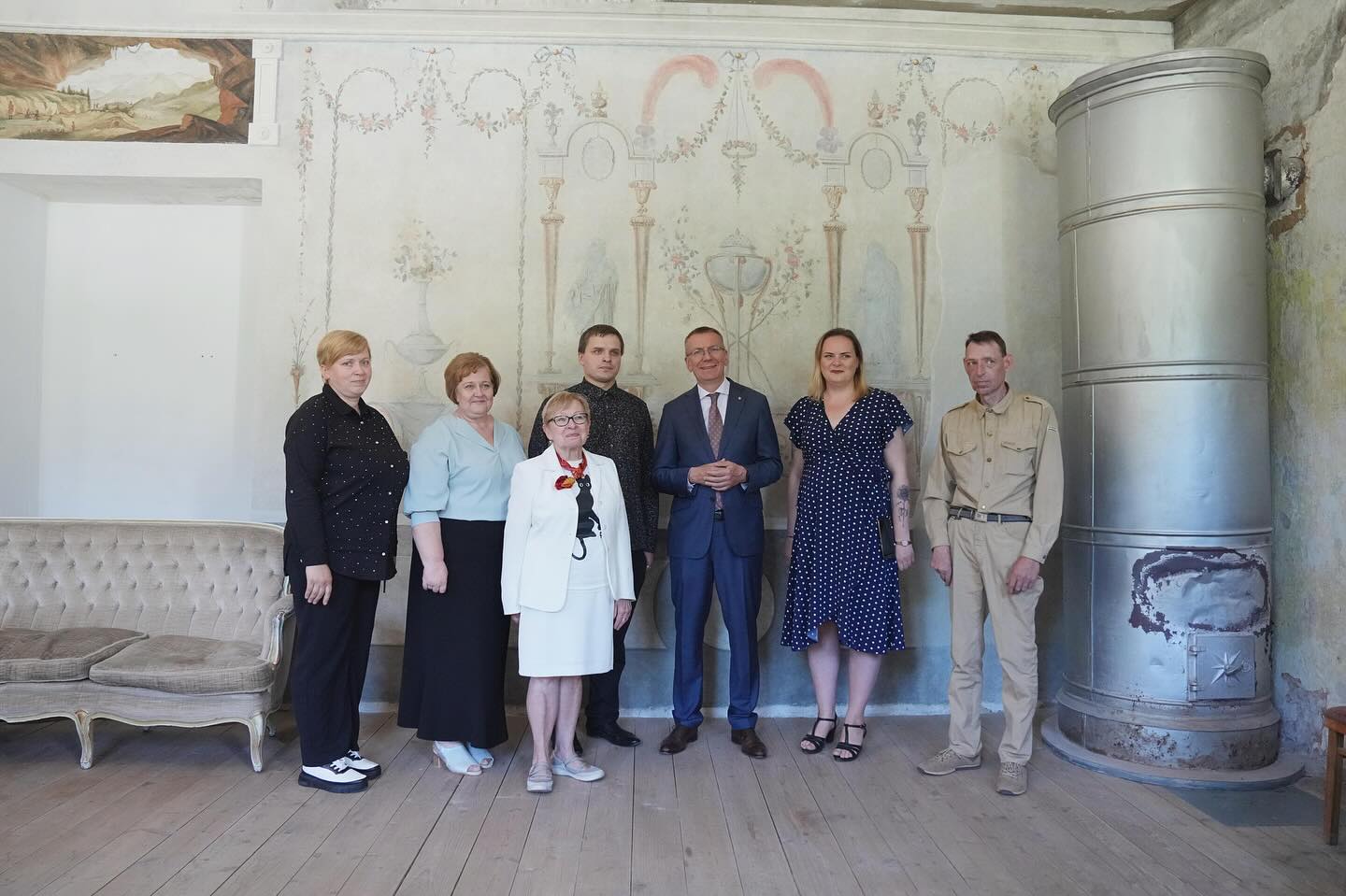 President examining heraldic display